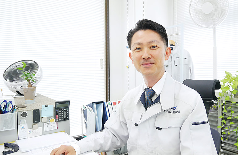 専務取締役 根本 勇也